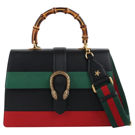 black gucci purse with red and green stripe